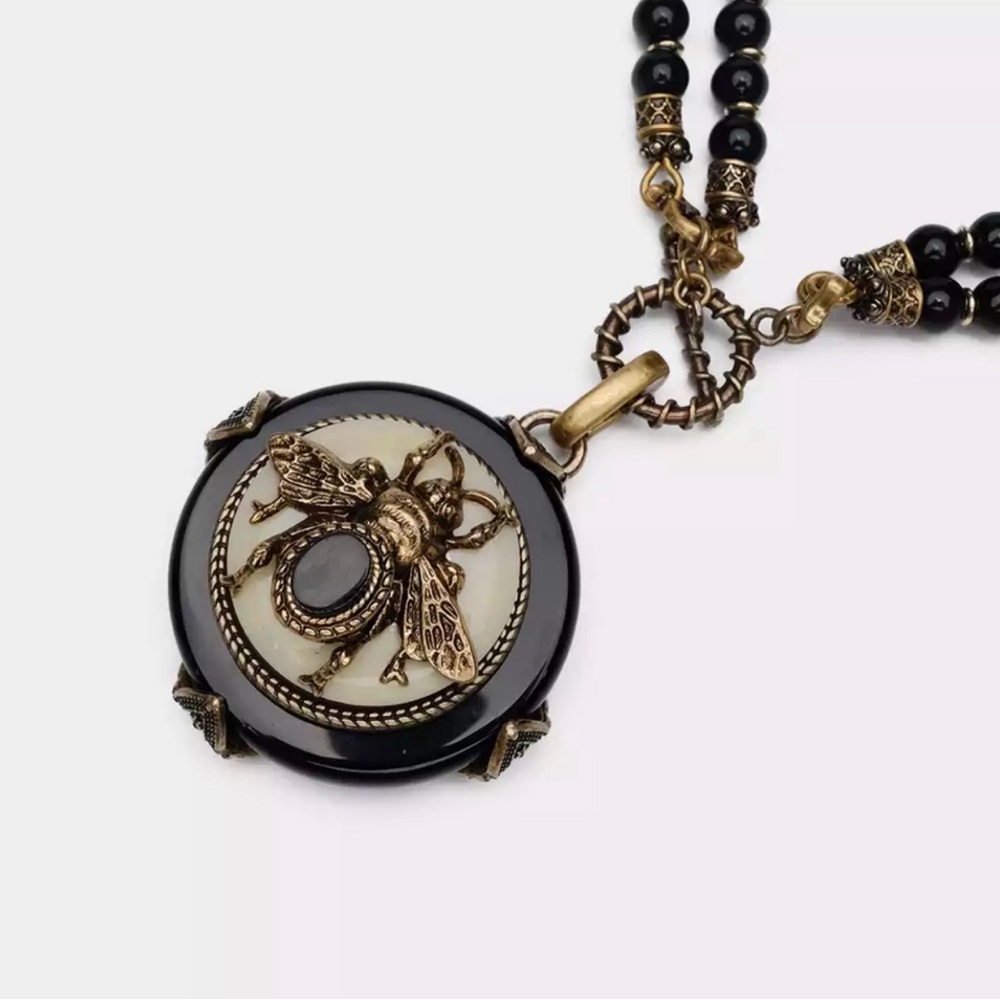 Ebony Bee beaded Necklace, black, Ivory and bronze.